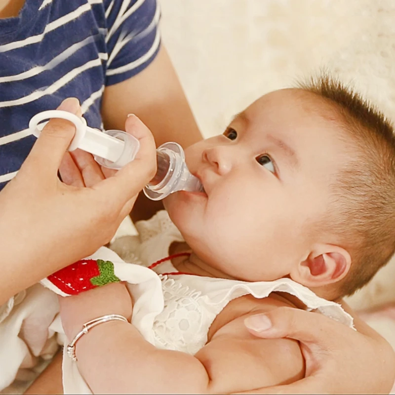 Baby feeding himself