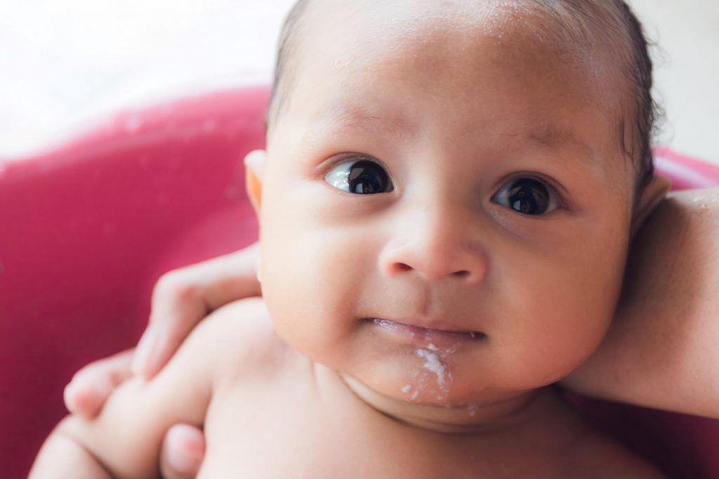 Baby throws up milk after feeding