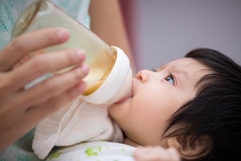 Baby falls asleep while feeding on the bottle