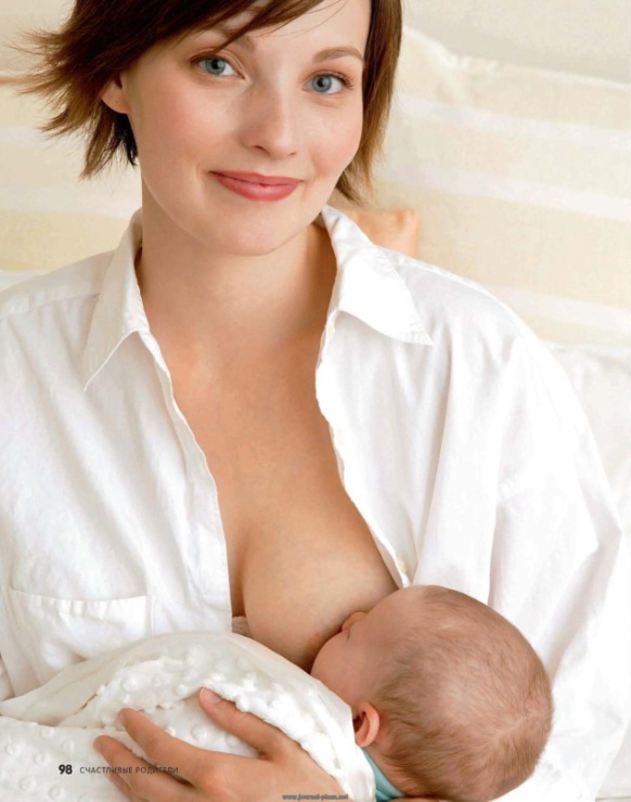 Woman breast feeding baby