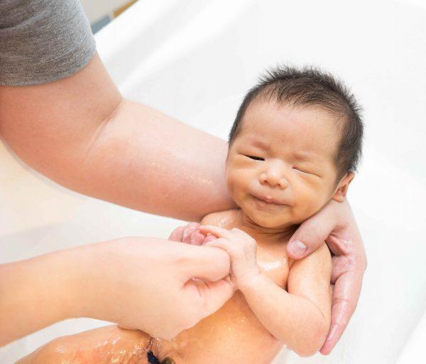 Newborn baby sick after feeding