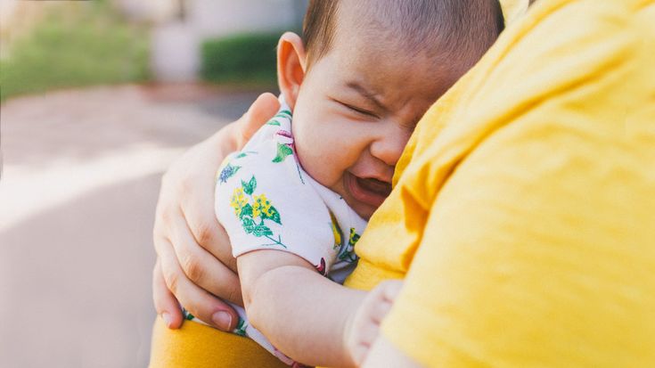 2 month old baby cries after feeding