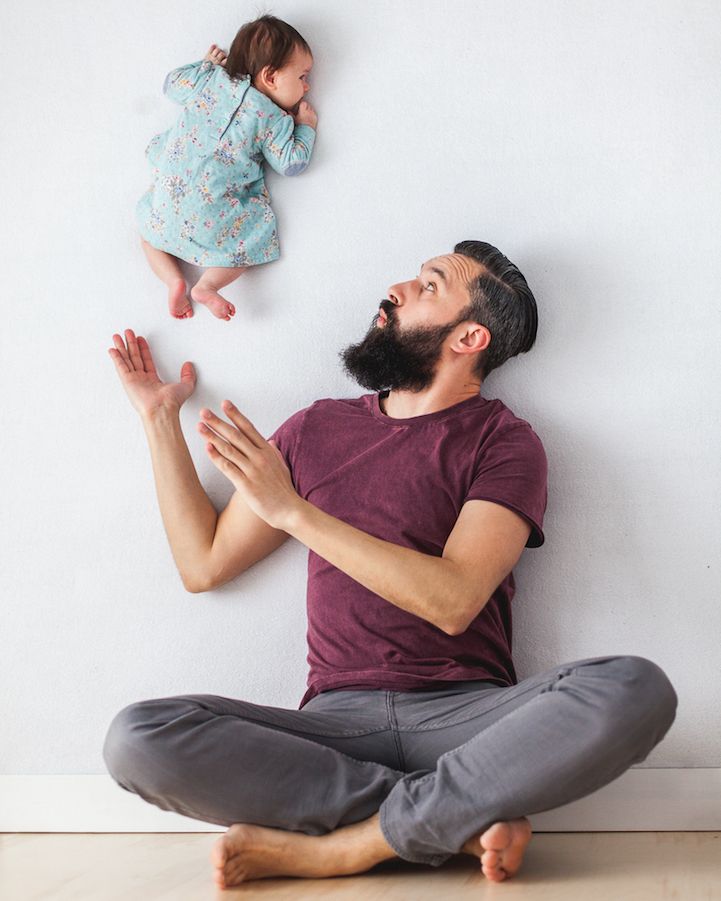 Dad feeding baby