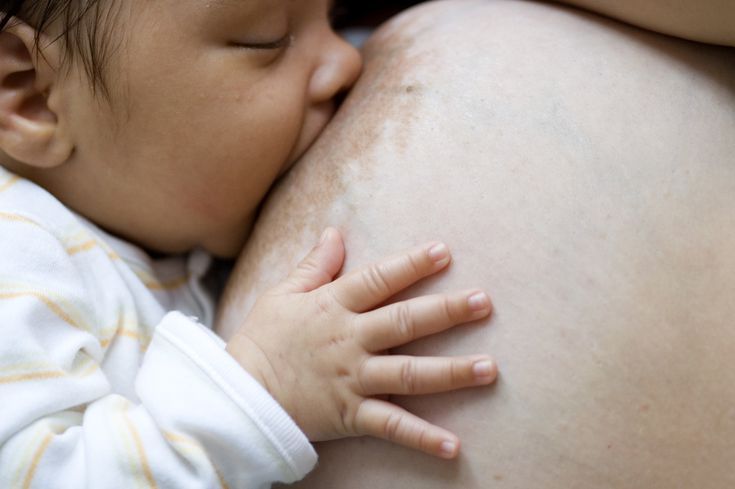 Feeding the baby in sleeping position