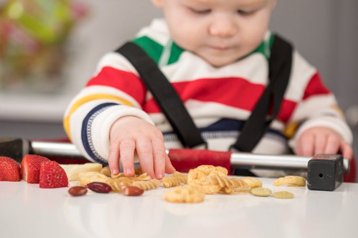 Finger feeding baby solids