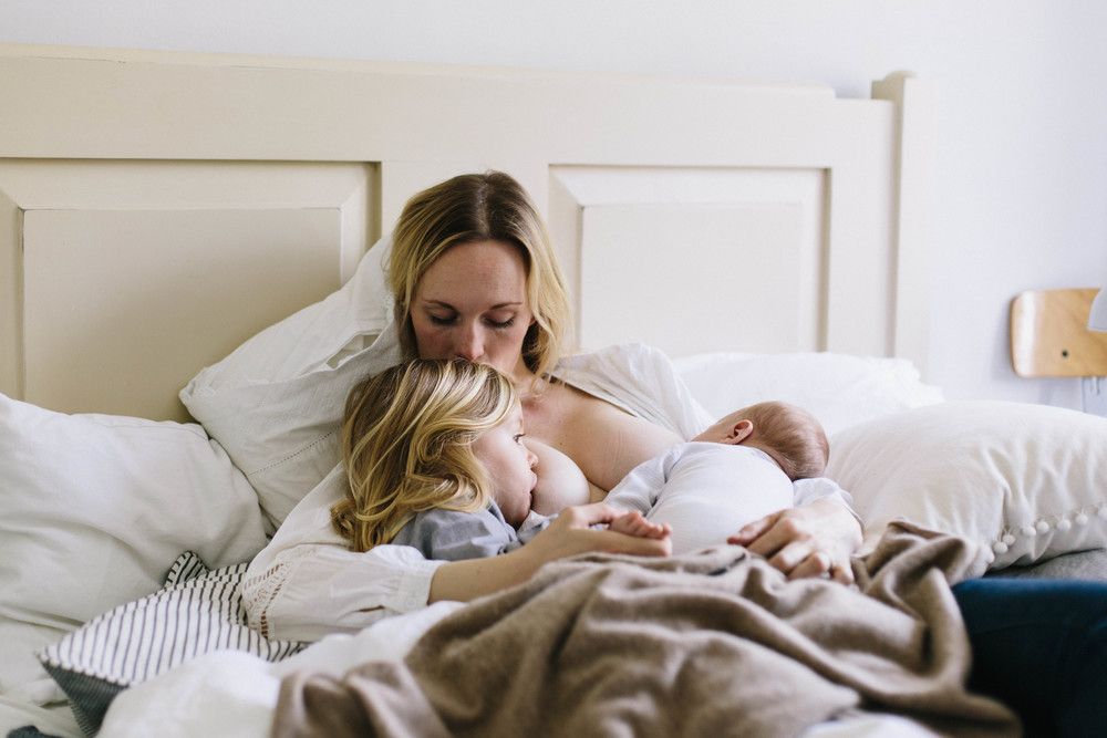 Breast feed newborn baby