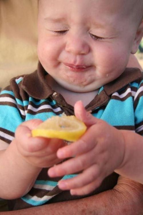 Baby eating sour food