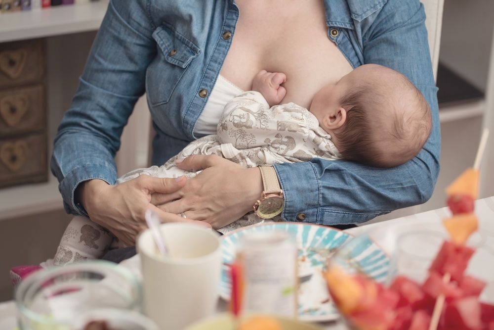 Baby getting breast feed