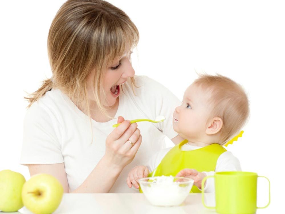 Feeding peas to babies