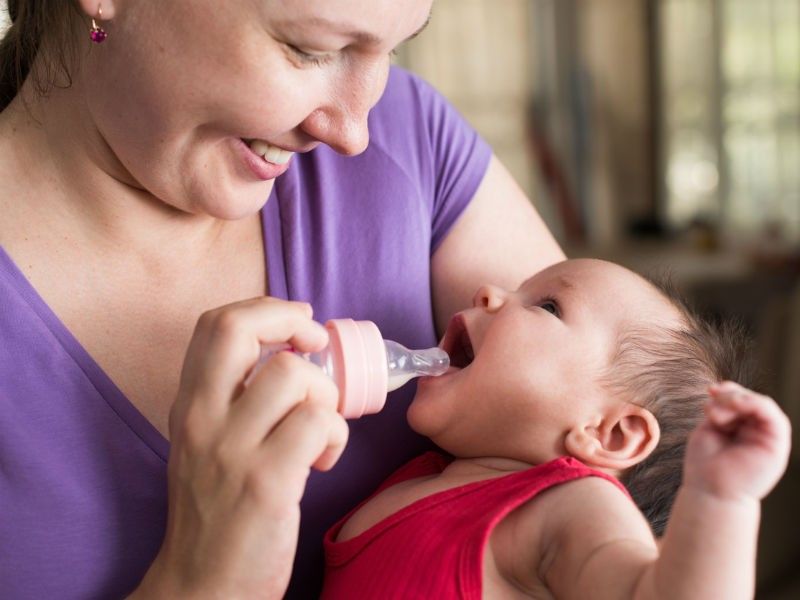 Breastfed baby spit up after every feeding