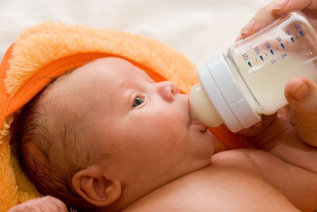 Best position to bottle feed newborn baby