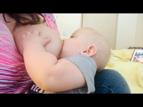 Breast feeding baby and husband