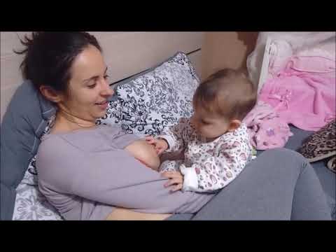 Mom breast feeding baby video