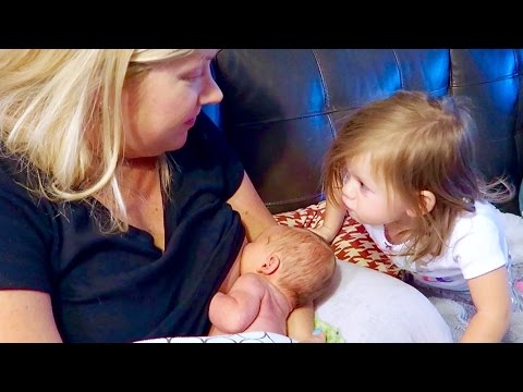 Girl breast feeding baby video