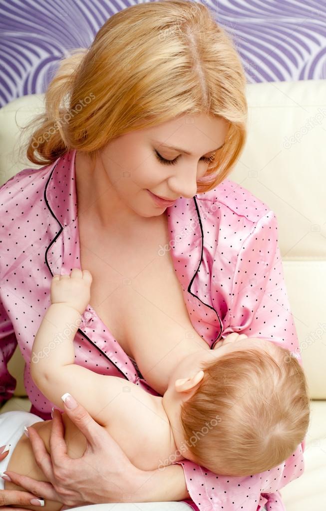 Feeding baby by breast